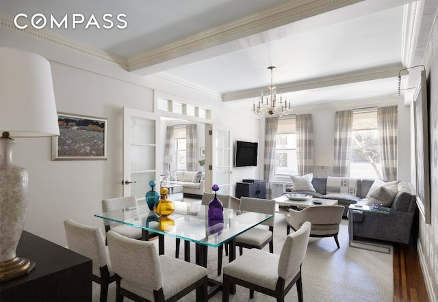 dining space featuring a notable chandelier, ornamental molding, and beamed ceiling