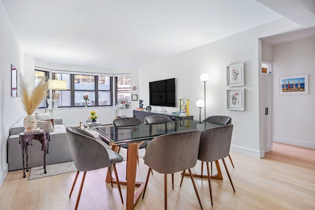 dining room featuring light hardwood / wood-style floors