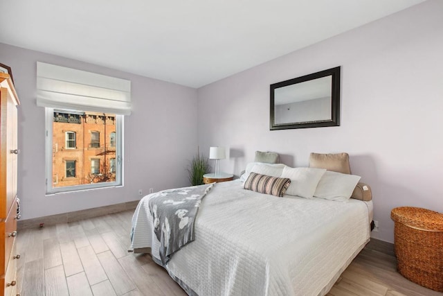 bedroom featuring hardwood / wood-style flooring