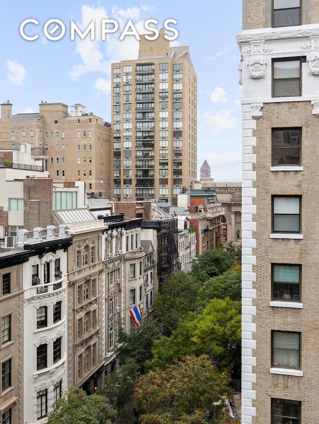 view of property with a city view