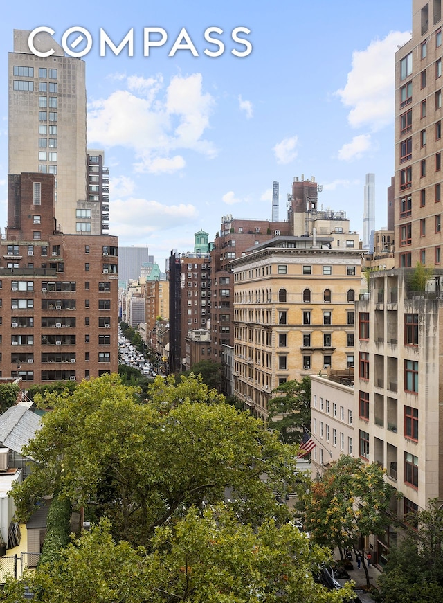 view of building exterior featuring a city view