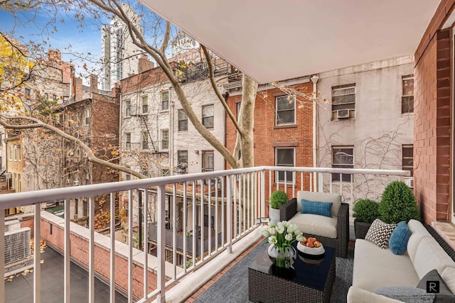 balcony with an outdoor hangout area