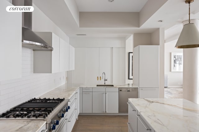 kitchen featuring sink, white cabinetry, and stainless steel dishwasher