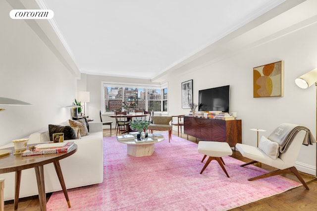 living room with parquet floors and ornamental molding