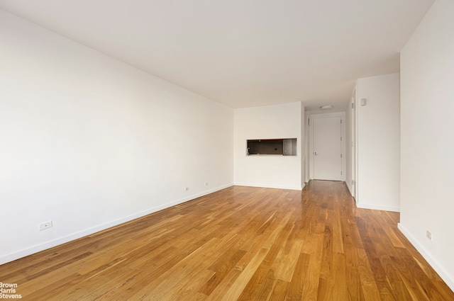 515 E 72nd St Unit 4A, New York City, NY 10021 - unfurnished room featuring light wood finished floors and baseboards