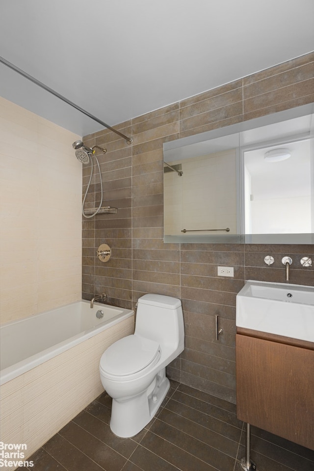 515 E 72nd St Unit 4A, New York City, NY 10021 - full bathroom with tile walls, tiled shower / bath combo, vanity, and toilet