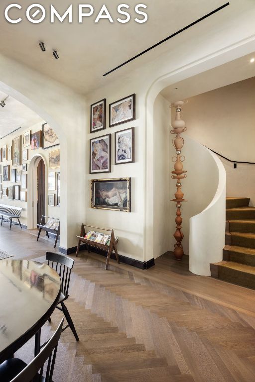 dining area with parquet flooring