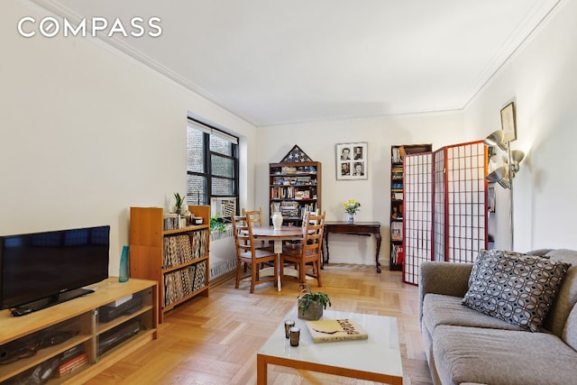 living room with light parquet flooring and ornamental molding