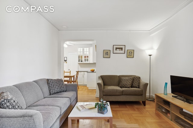 living room with crown molding