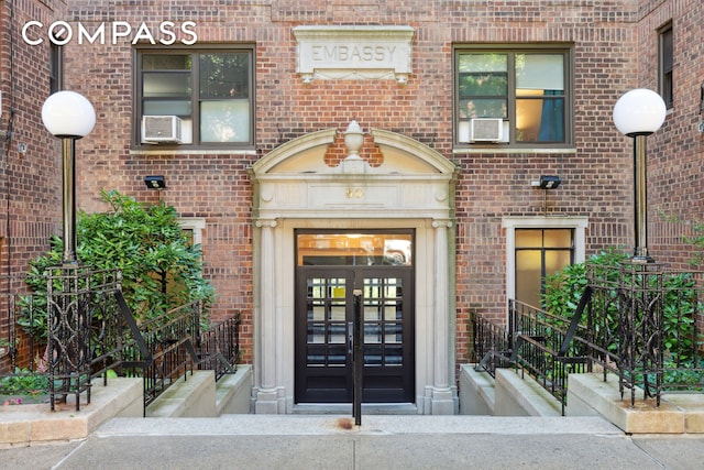50 Park Ter E Unit 7E, New York City, NY 10034 - doorway to property featuring brick siding and cooling unit
