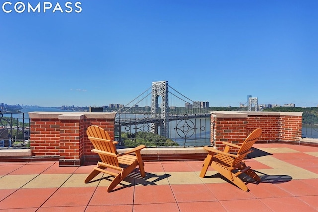 view of patio / terrace with a water view