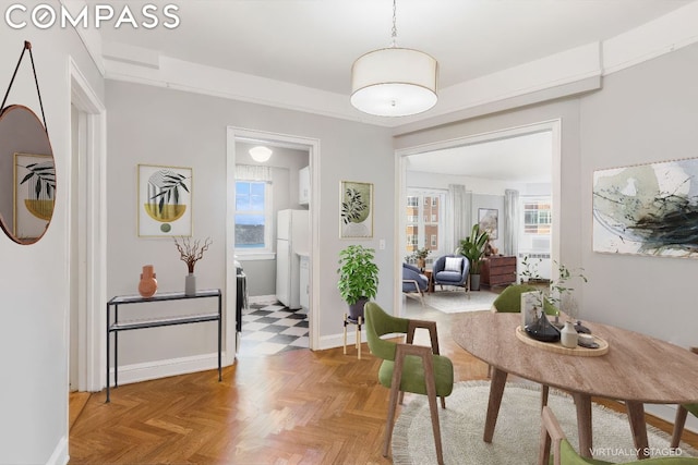 interior space featuring parquet flooring