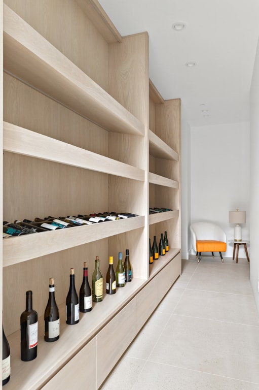 wine cellar with light tile patterned floors