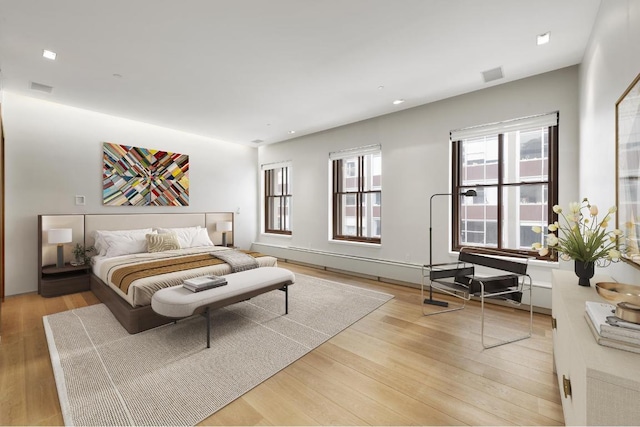 bedroom featuring light hardwood / wood-style floors