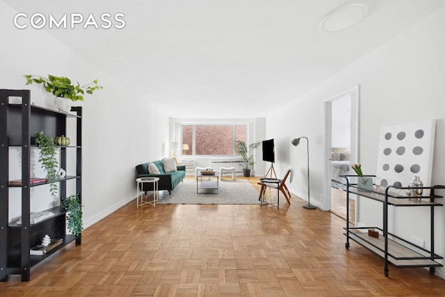 living room featuring light parquet floors