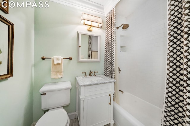 full bathroom featuring toilet, vanity, tiled shower / bath combo, and crown molding