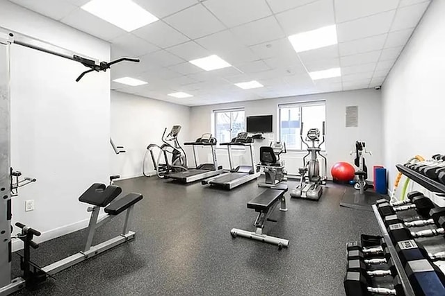 workout area featuring a drop ceiling