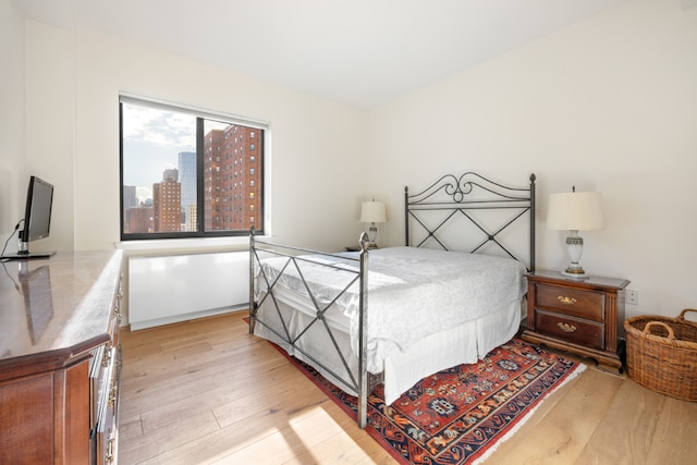 bedroom featuring light wood-type flooring