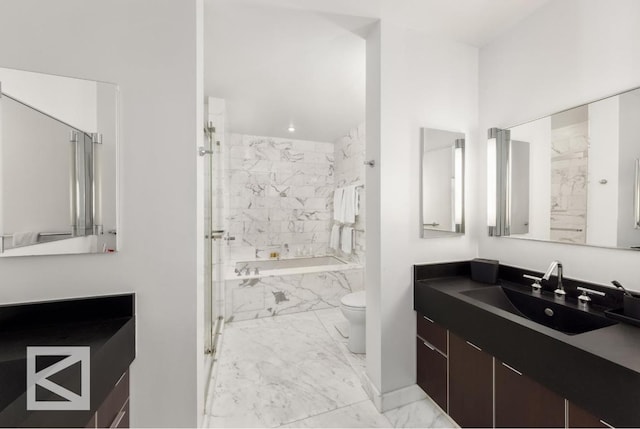 full bathroom featuring toilet, vanity, and independent shower and bath