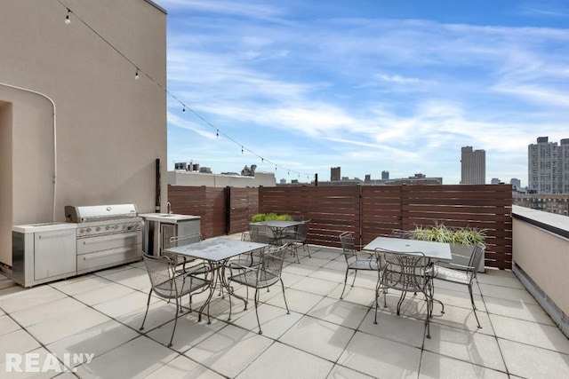 view of patio with a grill