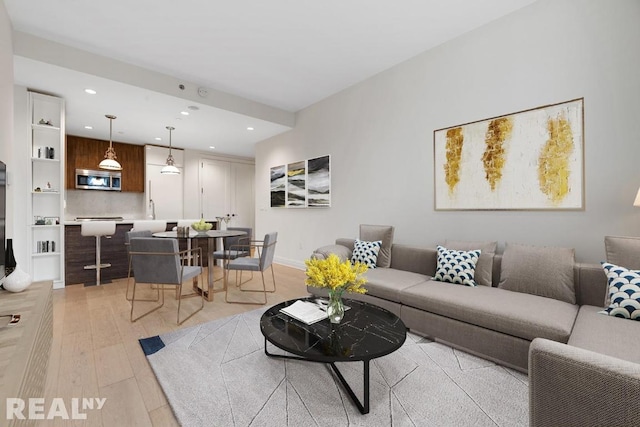 living room featuring light wood-type flooring