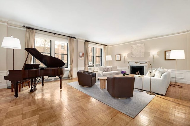 living room with light parquet flooring and crown molding