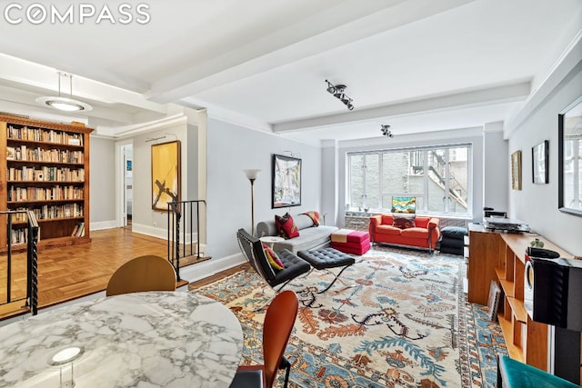 living room with parquet flooring and beamed ceiling