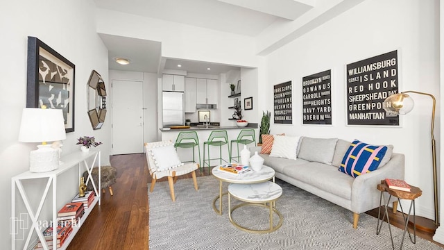 living room featuring dark wood-type flooring