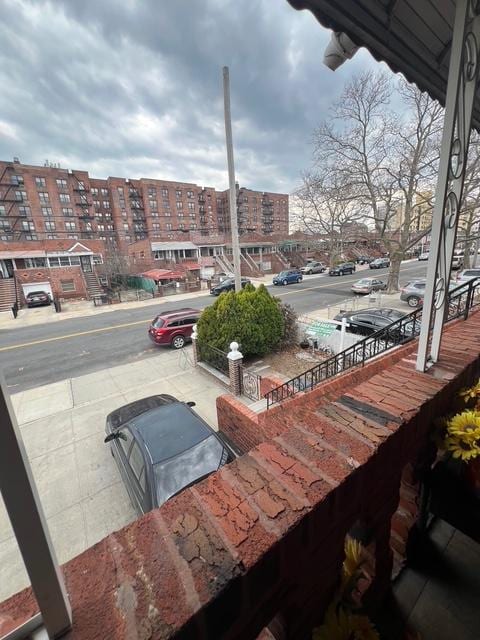 1241 E 98th St, New York City, NY 11236 - view of patio / terrace with a city view