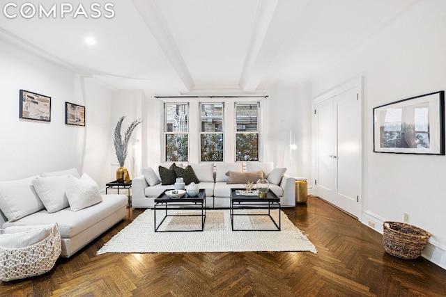 living room with beam ceiling and dark parquet floors