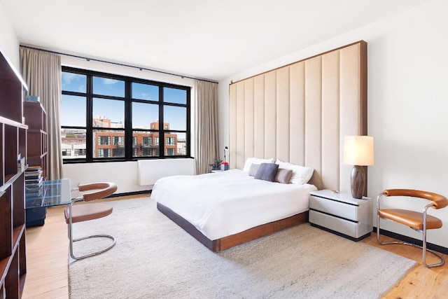 bedroom featuring hardwood / wood-style flooring