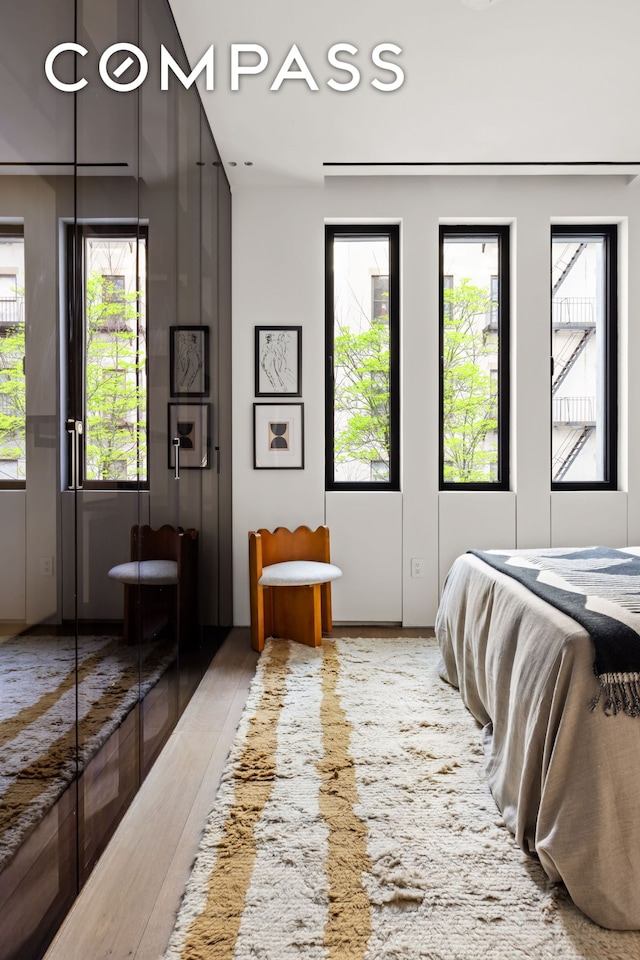 bedroom with light wood-style floors