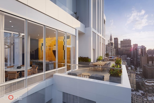 view of patio / terrace with a balcony