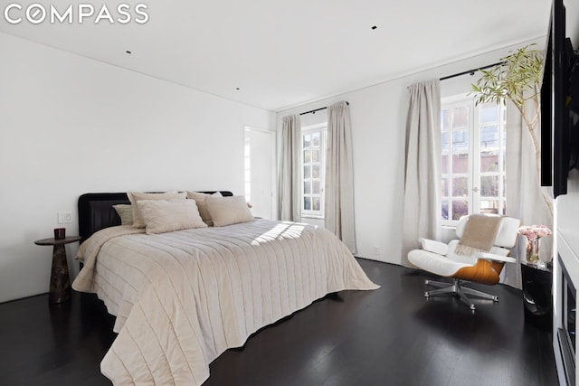 bedroom featuring wood-type flooring