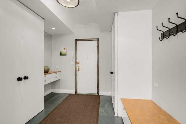 kitchen featuring sink, backsplash, light stone countertops, and high quality appliances