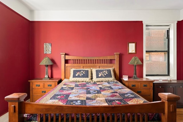 bedroom featuring hardwood / wood-style floors