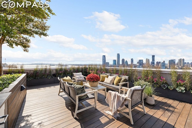 wooden deck featuring outdoor lounge area