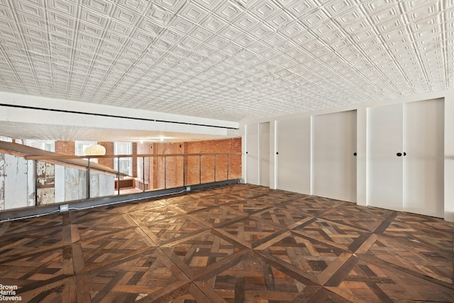 interior space featuring dark parquet flooring