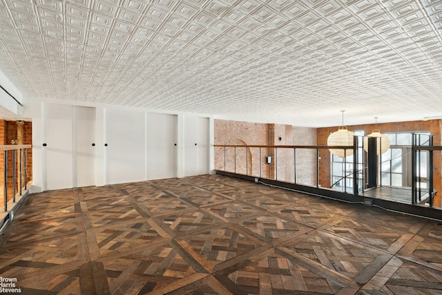 interior space featuring dark parquet flooring