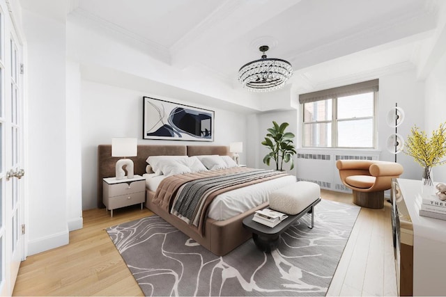 bedroom with an inviting chandelier, light wood-type flooring, radiator, crown molding, and beamed ceiling