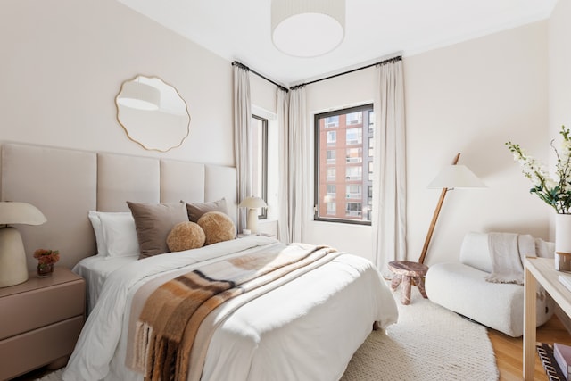 bedroom featuring light wood-type flooring