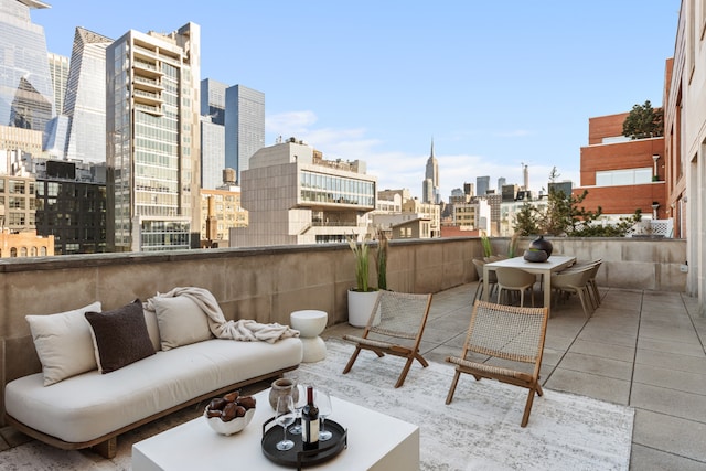 view of patio / terrace featuring an outdoor living space and a balcony