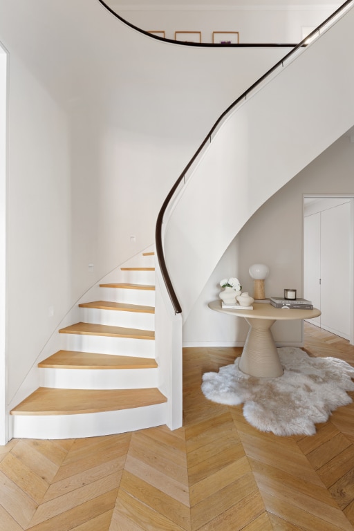 stairway with parquet floors