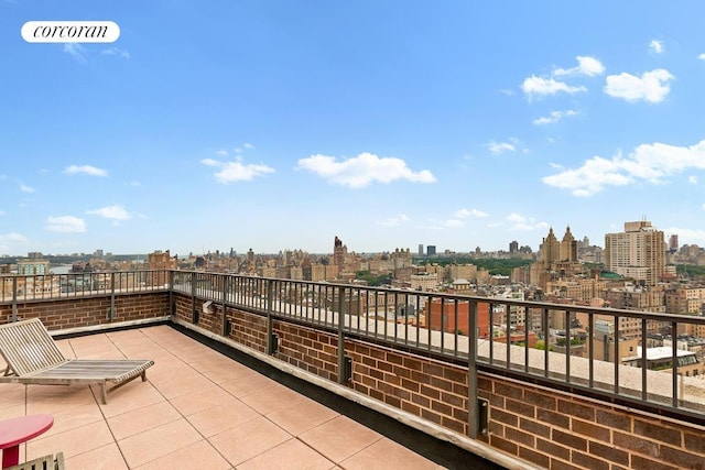 view of patio / terrace with a balcony