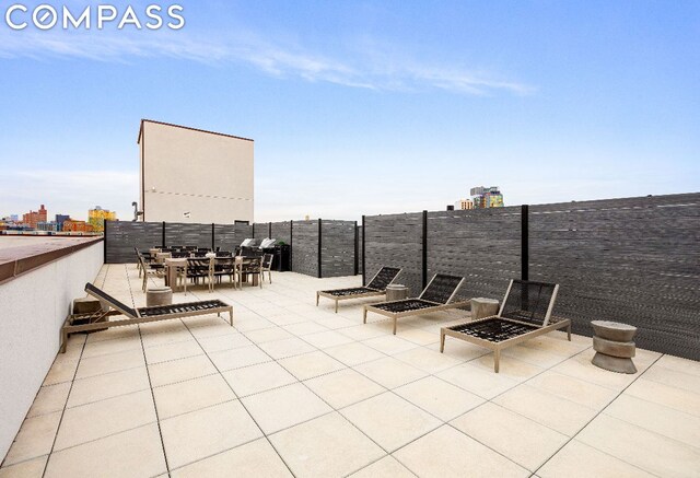 view of patio featuring a fire pit