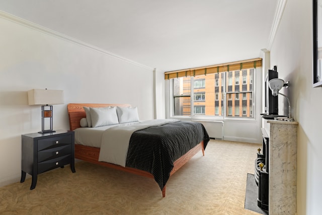 carpeted bedroom featuring radiator and ornamental molding