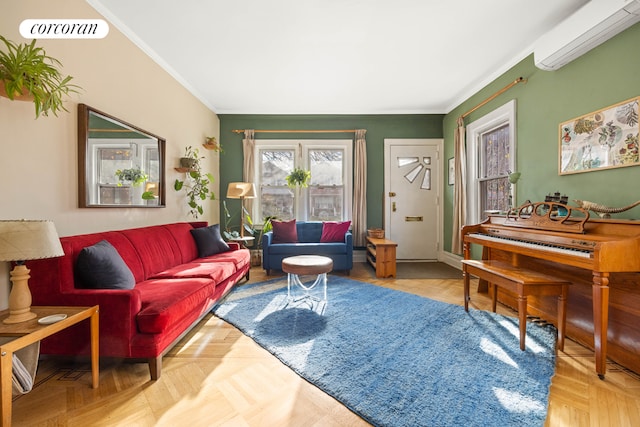 living room featuring light parquet floors, crown molding, and a wall mounted AC