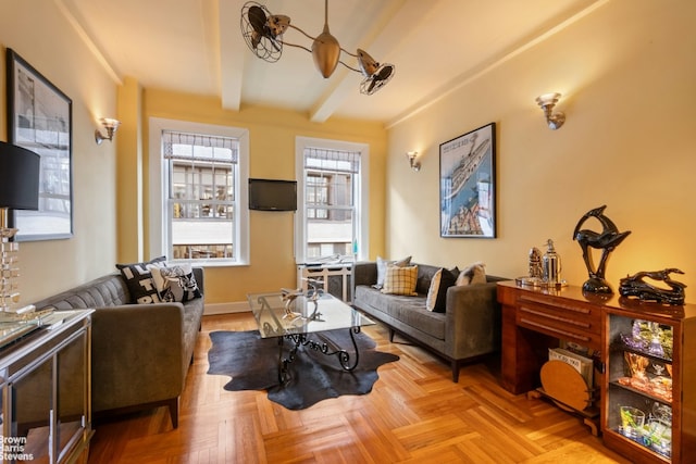 living room with beam ceiling and light parquet flooring