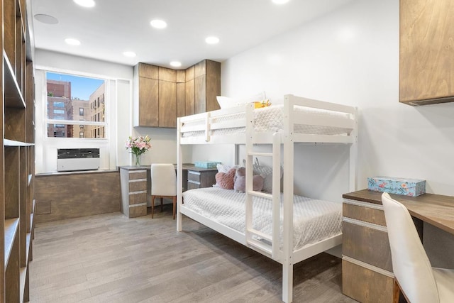 bedroom with light wood-type flooring