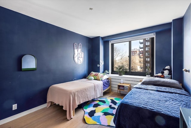 bedroom featuring light hardwood / wood-style floors